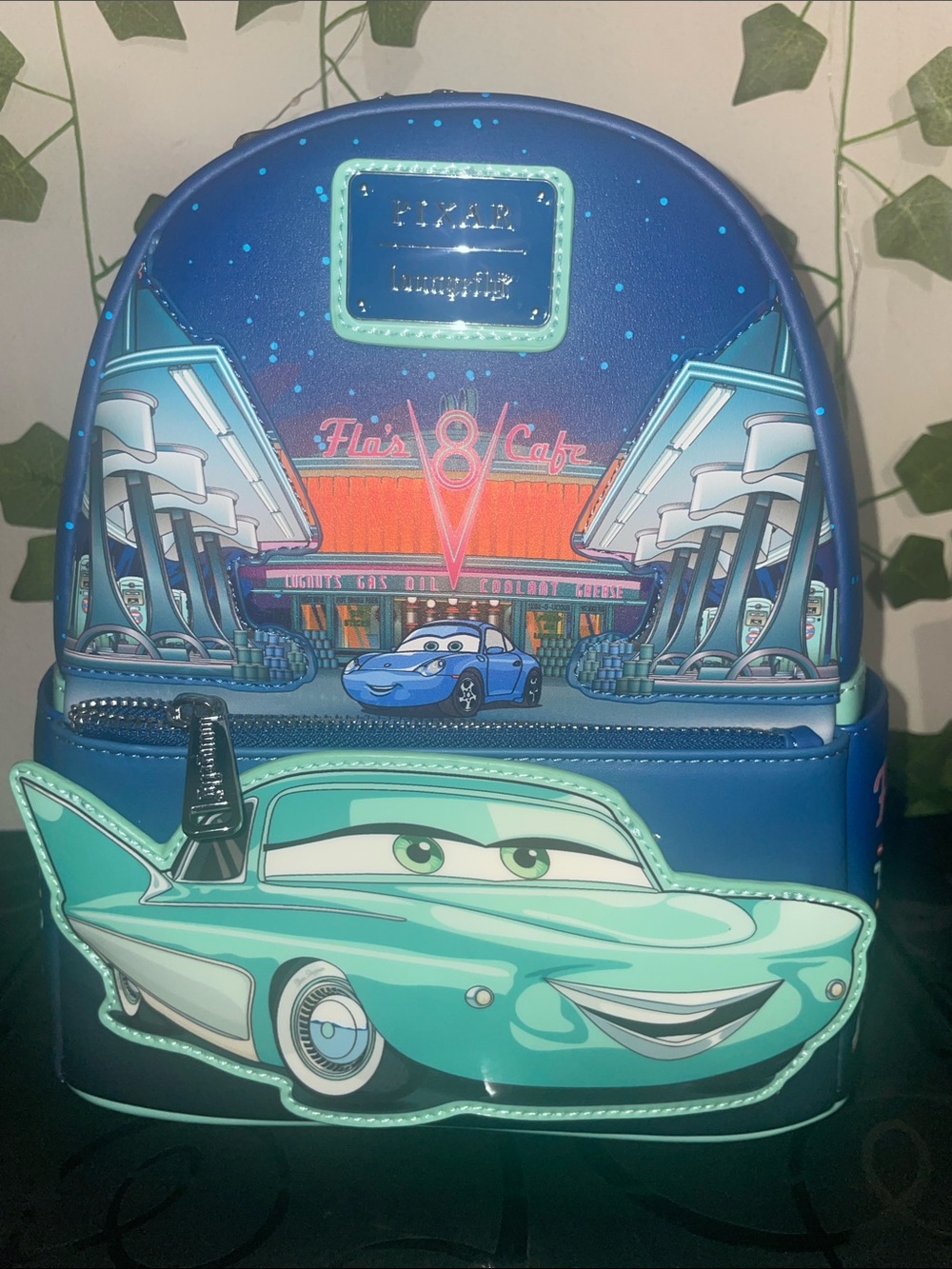Loungefly Disney Pixar Cars Flo’s V8 Cafe Glow-In-The-Dark Mini Backpack